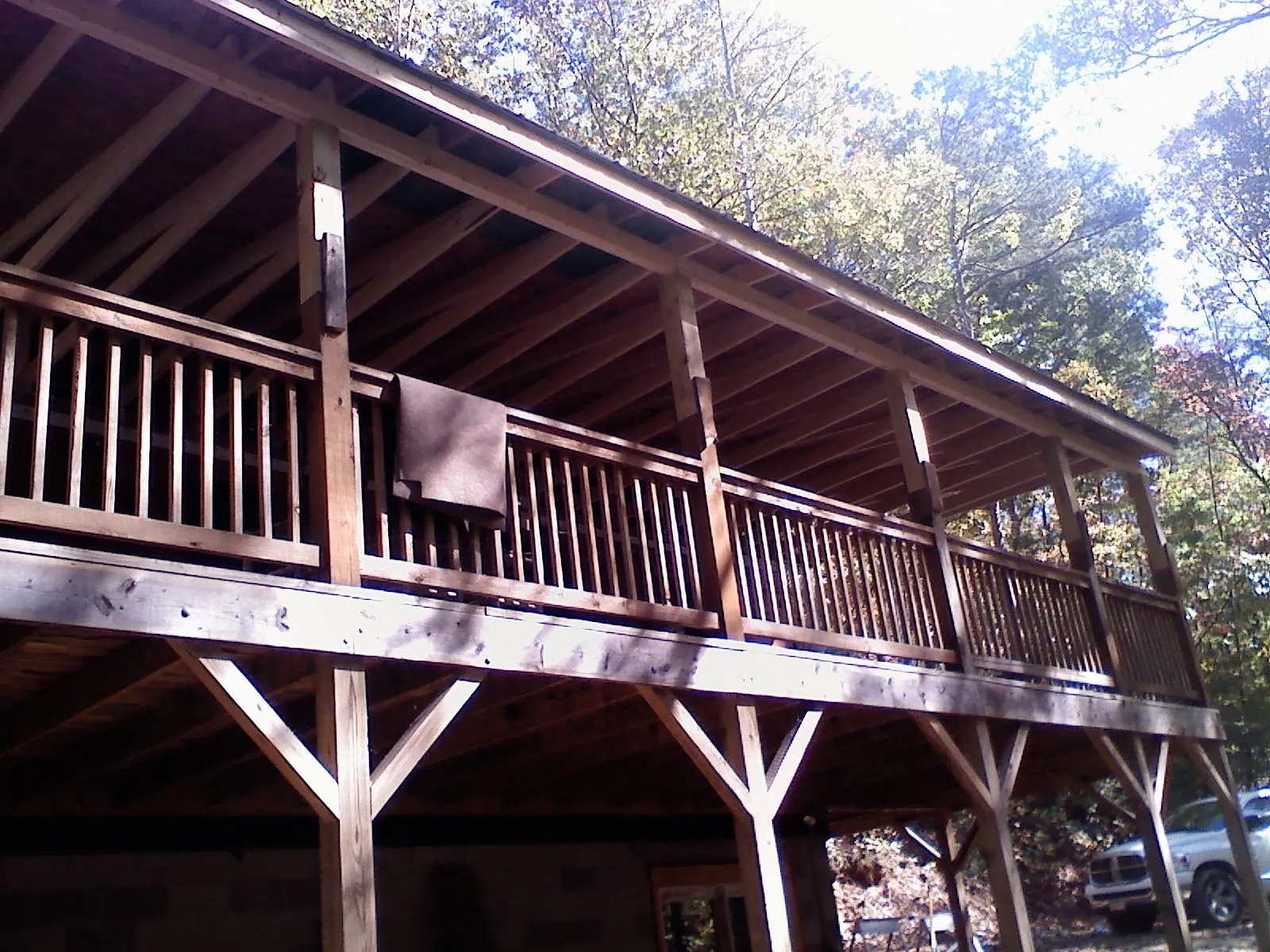 Timber framing under a new elevated porch and deck — Roof Leak Repair in Marmora by Roofing Brothers